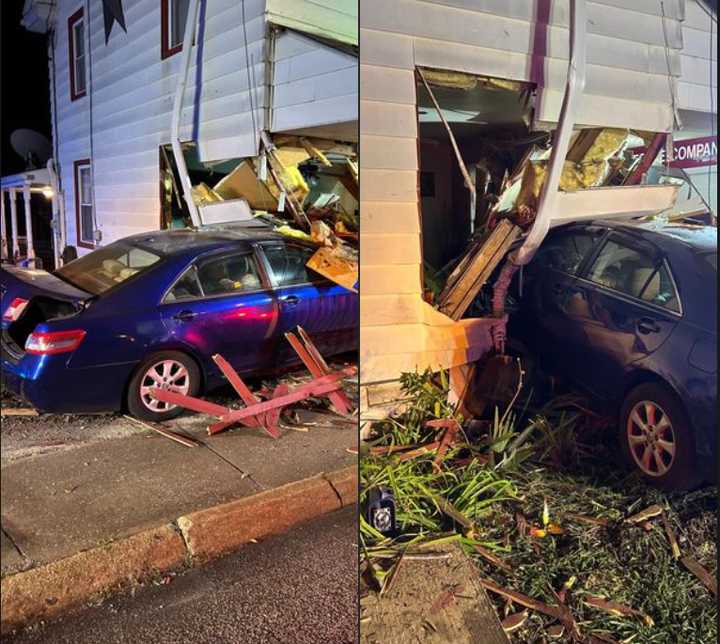 The scene of the car into a home in Etters.