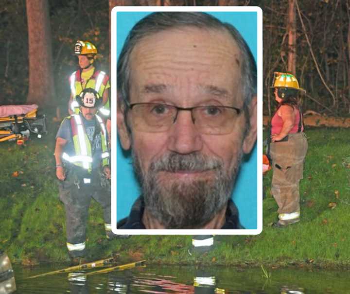 Kore Byler and first responders rescuing him from his pickup truck stuck in a pond.&nbsp;