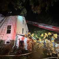 <p>Crews battle a blaze at 238 Silvermine Ave in Norwalk Monday evening, Dec. 16. 
  
</p>