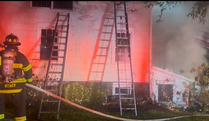 Crews battle a blaze at 238 Silvermine Ave in Norwalk Monday evening, Dec. 16. 