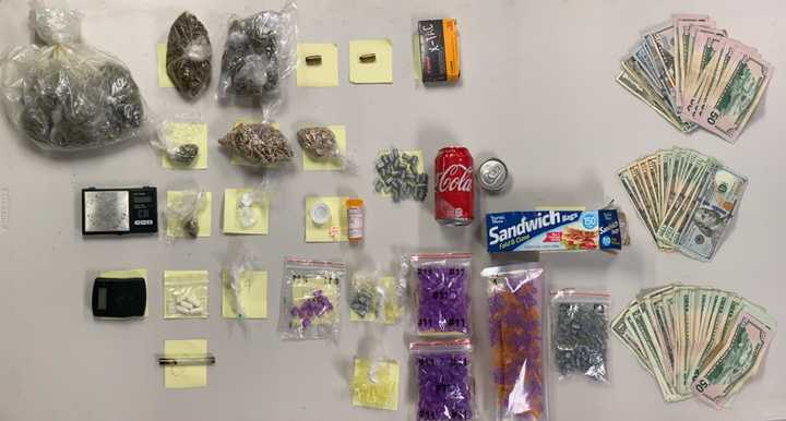 The recovered drugs and paraphernalia.