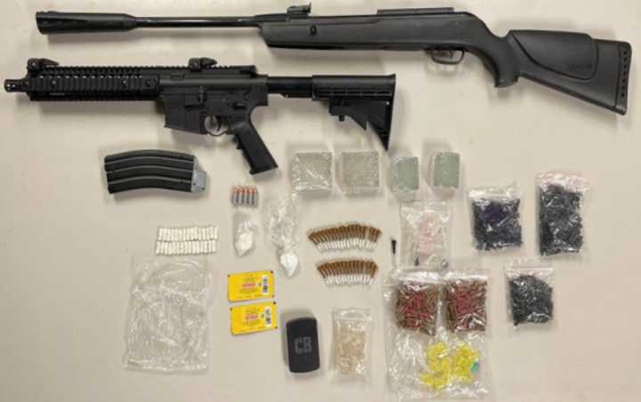 The recovered weapon and drugs.