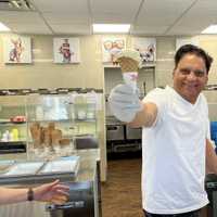 <p>Syed Rizvi at Ice Cream on Grand.</p>