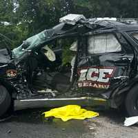 <p>The Roseland officer's vehicle was heavily wrecked in the Friday afternoon crash.</p>