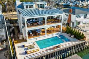 $12.5M Bayfront Beauty: NJ Beach Estate Has 5-Stop Elevator, Rooftop Deck