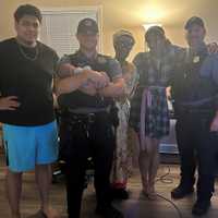 <p>Alexandria Police Officers Hiltz and Reilly reunited with Baby Luis IV and his family.</p>