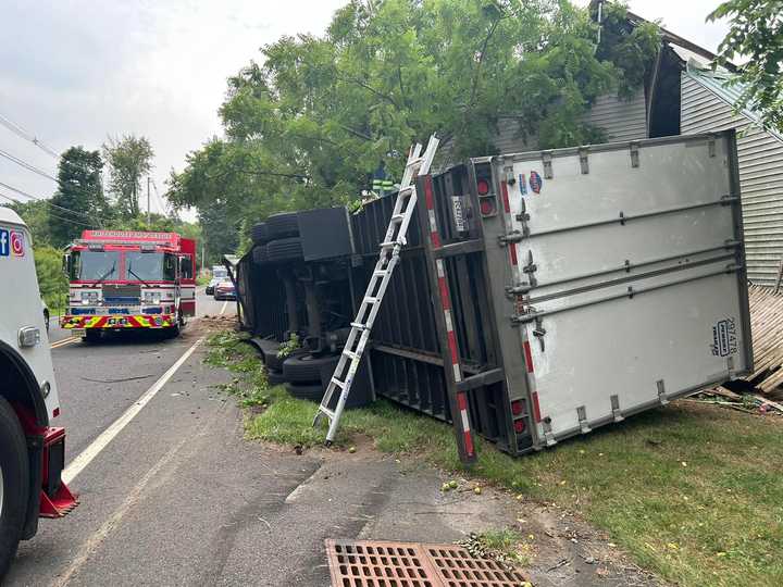 A trailer crashed into a barn in Readington.