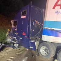 <p>The trailer of one of the tractor-trailers involved in the crash going off I-81.</p>