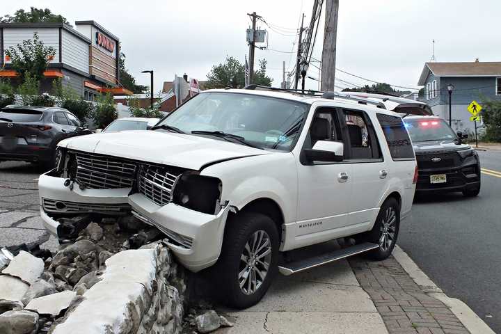 SUV Slams Rocky Retaining Wall Of Midland Park Church (PHOTOS)