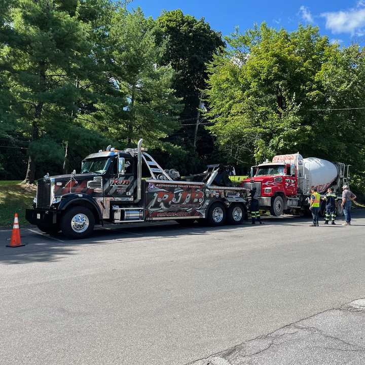 The overweight cement truck was eventually towed, police said. 