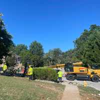 <p>Crews cleaning up the debris</p>