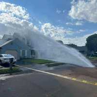 <p>A water main break doused a home with water on Woodbrook Drive in Edison, NJ, on August 12, 2024.</p>