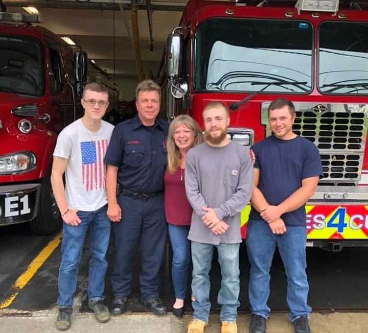 Ray Tibok with his wife,&nbsp;Rosemarie Tibok, and their sons, Ryan, Jonathan, and Evan.