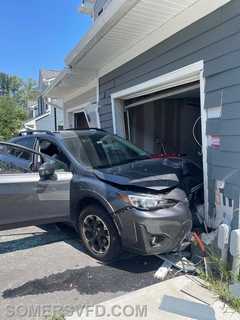 Car Crashes Into House In Westchester