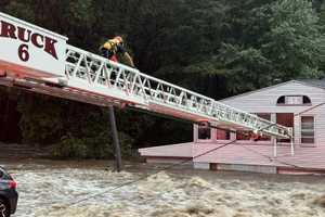 19 People, Dog Rescued From Oxford Restaurant, Home During Floods