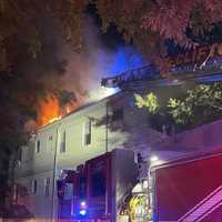 Flames Shoot From Roof Of Clifton Home