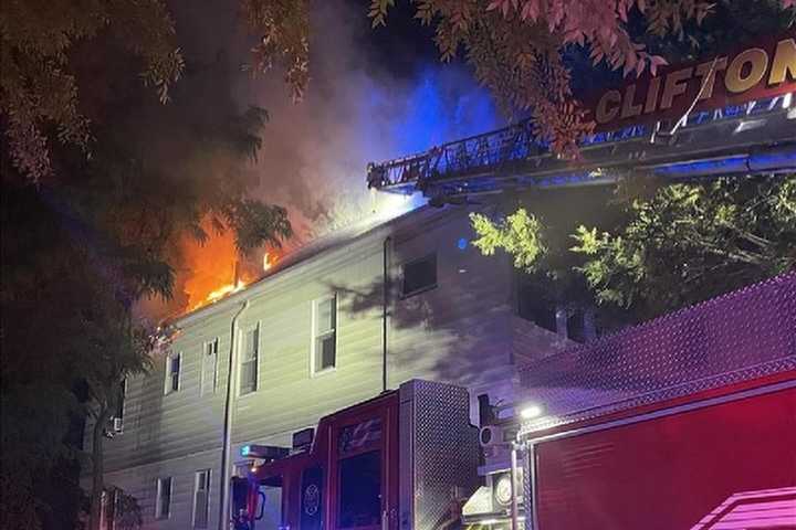 Flames Shoot From Roof Of Clifton Home