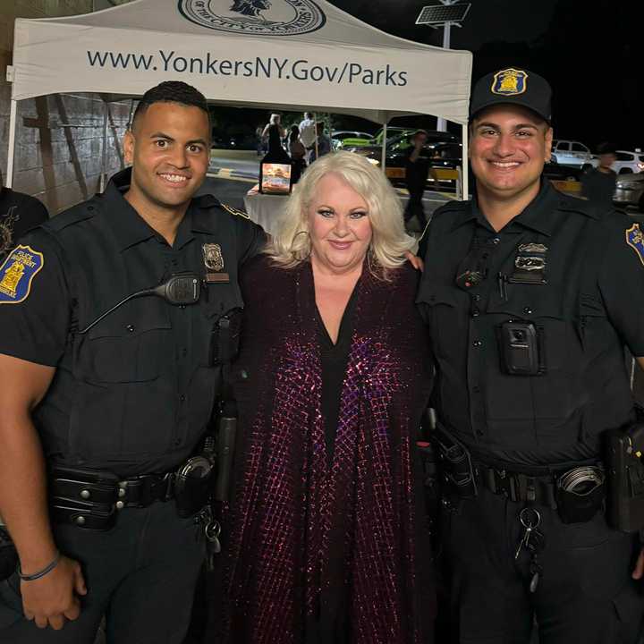 Disco singer France Joli pictured with officers from the Yonkers Police Department.&nbsp;