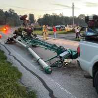 <p>The farm equipment that struck the front end of an SUV.</p>