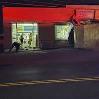 <p>The tractor-trailer rolled over and plowed into the Littlestown Laundromat. </p>