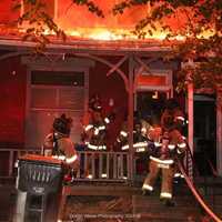 <p>Firefighters at the scene of the row home fire in the&nbsp; 200 block of North 15th Street in Harrisburg.</p>