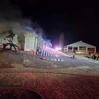 <p>Firefighters battling the barn fire. </p>