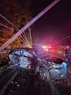 Driver Hospitalized After Car Snaps Poles In Northern Westchester