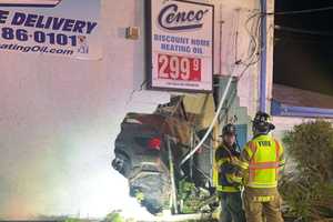 Driver Extricated After Vehicle Crashes Through Route 130 Building In Burlington