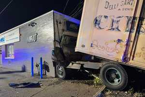 Aviation Repair Shop Seriously Damaged By Vehicle Rolling Off Tow Truck On Route 17