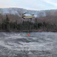 <p>The National Guard has dropped more than&nbsp;117,000 gallons of water in two days.</p>