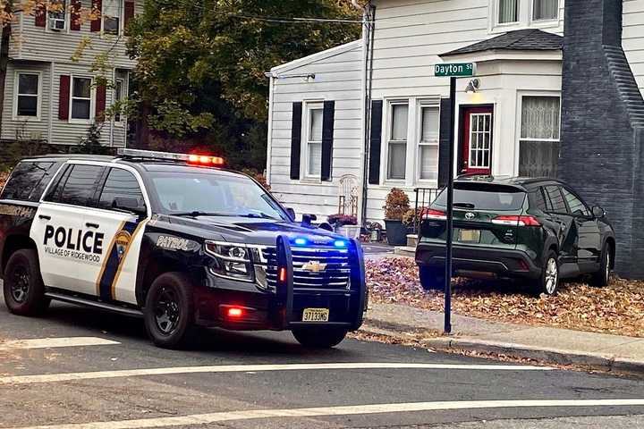 SUV Launched Onto Ridgewood Lawn In Crash, 1 Hospitalized