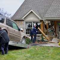 <p>The vehicle being pulled from the home in Leacock Township.</p>