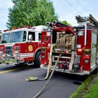 Woman Critically Injured In Bay Shore House Fire; Firefighters Were Slowed By 'Hoarding'