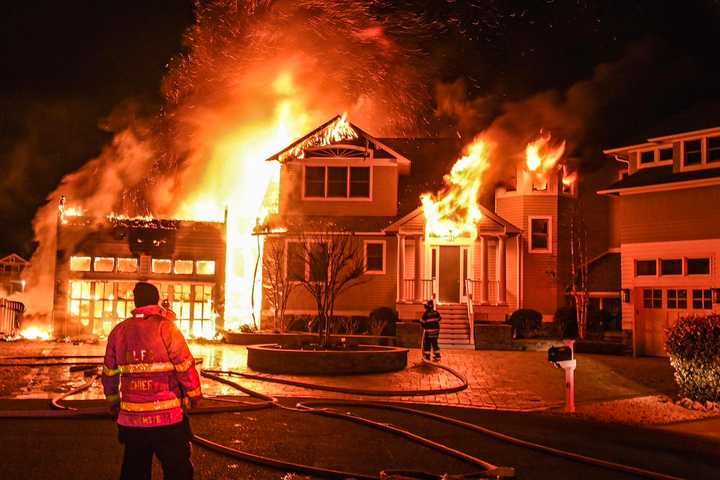 A fire destroyed a waterfront home in Long Beach, NJ, on December 23, 2024.