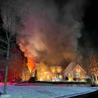 Firefighters Endure Brutal Cold To Extinguish Raritan Blaze: Authorities