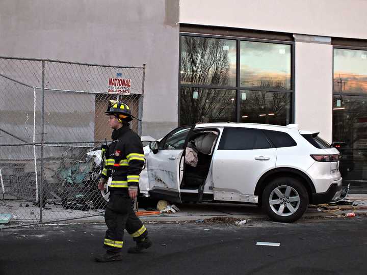 A four-vehicle crash damaged a building at a shopping plaza on Route 17 in Paramus.