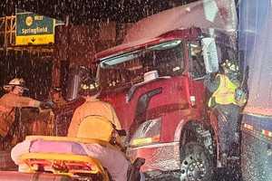 Tractor-Trailer Crashes, Traps Driver On I-395 In Virginia