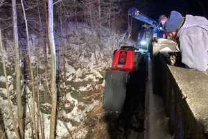 Driver Rescued After Jeep Plunges Onto Railroad Bed: Knowlton Fire