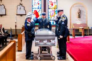 PHOTOS: Funeral Of Baltimore Officer Captured In Series Of Heartbreaking Shots