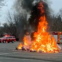 Garbage Truck Fire Forces Emergency Dump In Parking Lot (PHOTOS)