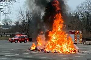 Garbage Truck Fire Forces Emergency Dump In Parking Lot (PHOTOS)