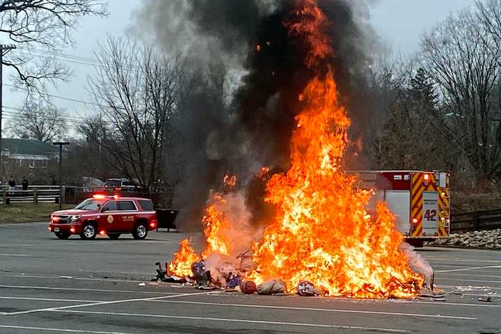 Garbage Truck Fire Forces Emergency Dump In Parking Lot (PHOTOS)