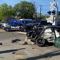 Driver Narrowly Escapes Death When Transit Train Slams Vehicle On Tracks In Fair Lawn (PHOTOS)