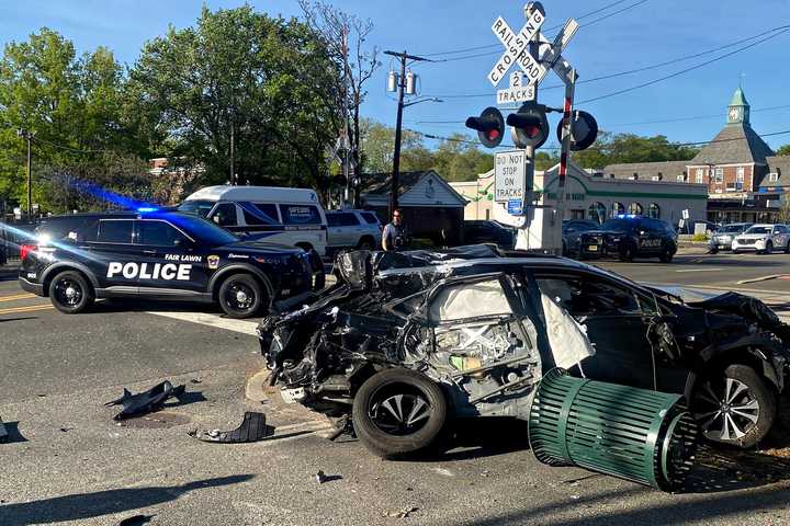 Driver Narrowly Escapes Death When Transit Train Slams Vehicle On Tracks In Fair Lawn (PHOTOS)