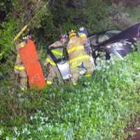 Car Plunges Off Road, Into Pole In Carmel