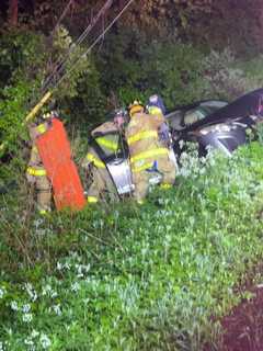 Car Plunges Off Road, Into Pole In Carmel
