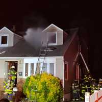 Man Critical, 4 Rescued Including 6-Year-Old Boy From East Meadow House Fire