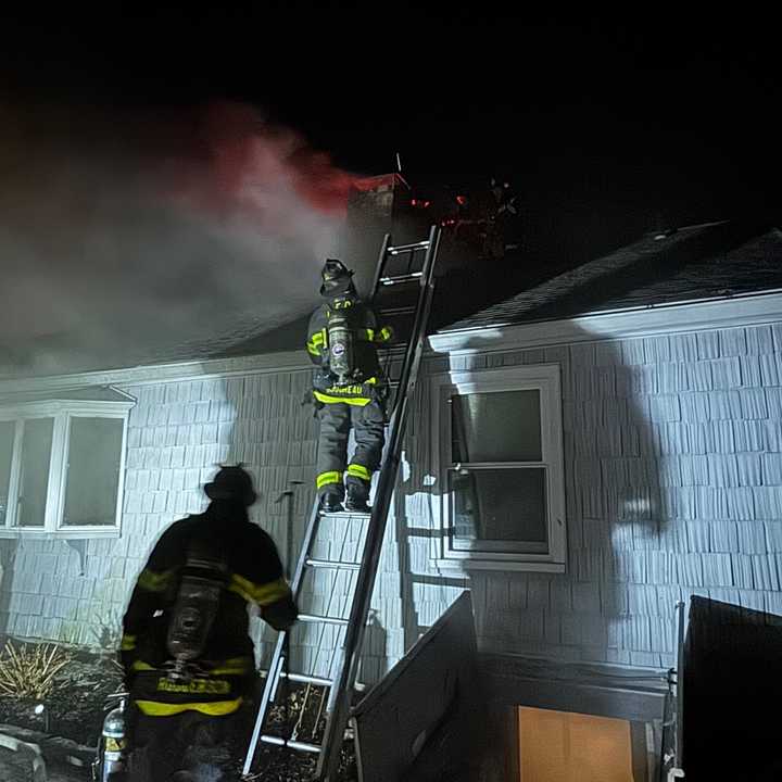Norwalk firefighters battle a blaze at 4 Tonetta Circle in the early morning of Sunday, March 9. 