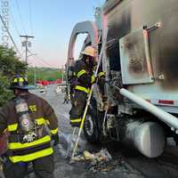 Fire Sparks Inside Garbage Truck In Somers
