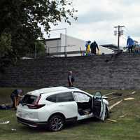 SUV Goes Airborne Over 15-Foot Wall In Fair Lawn Crash (PHOTOS)
